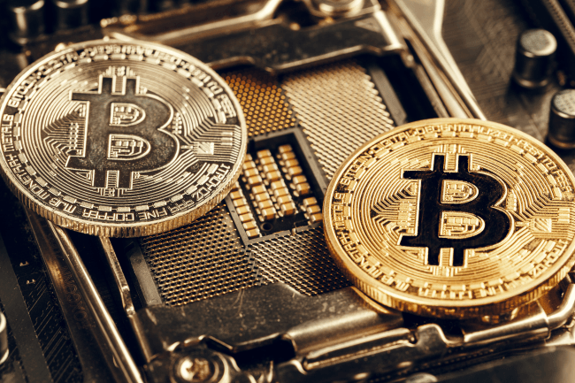 Golden bitcoin and computer chip 
